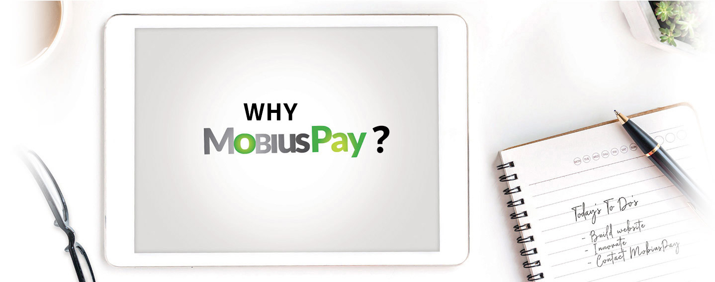 A table with a notepad, ipad, coffee and glasses to show the innovative things you come up with and how you should contact MobiusPay who does Credit Card payment processing supported by people with  years of banking knowledge.